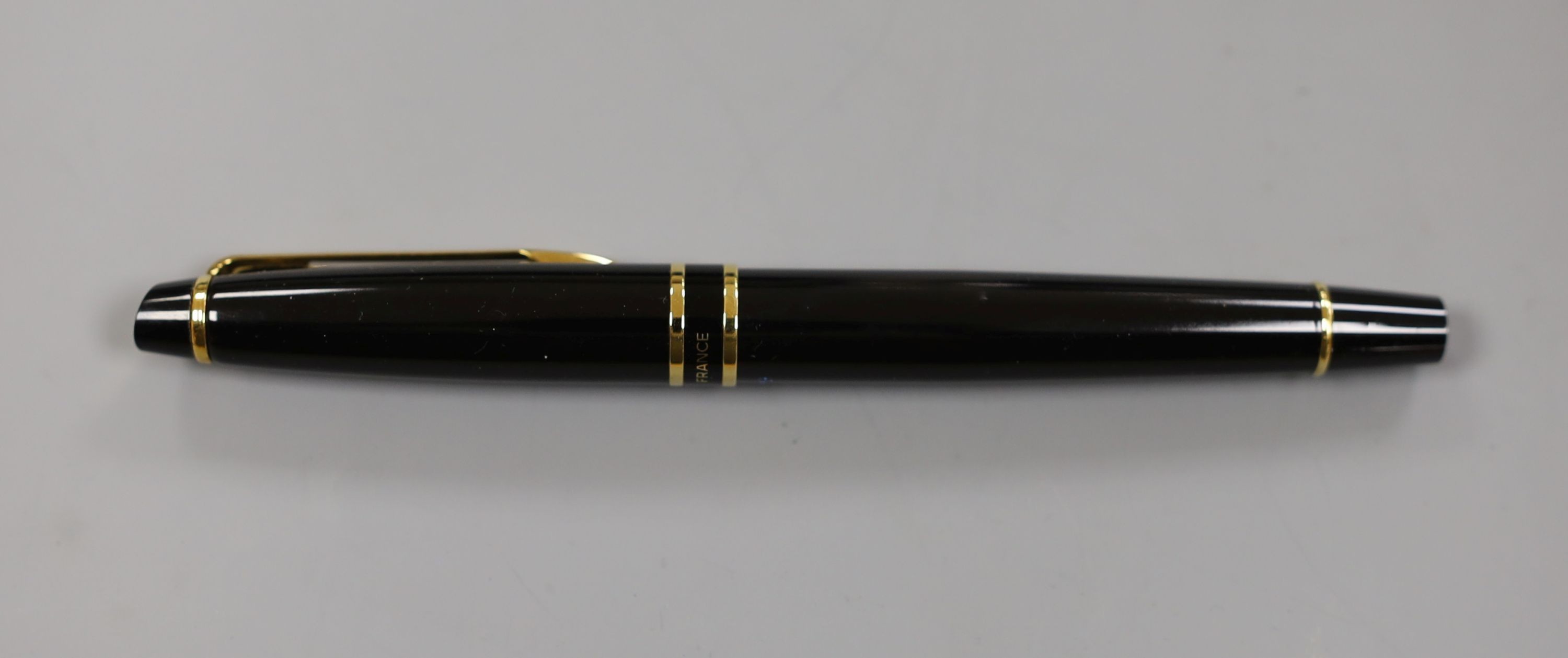 A Waterman fountain pen and ballpoint pen and a Mont Blanc Meisterstuck pen, all cased
